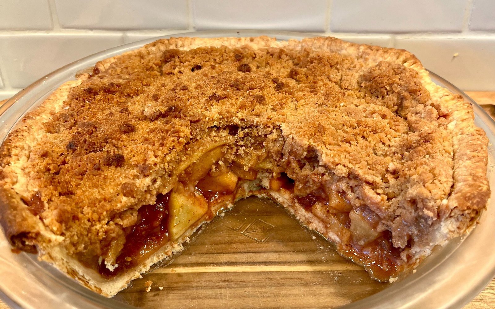 Dutch Apple Crumb Pie with Bourbon Reduction