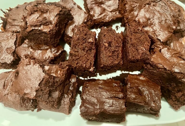 Homemade bakery-style chocolate brownies with crackly tops and fudgy centers